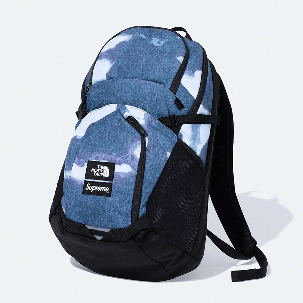 Supreme x The North Face Bleached Denim Print Backpack streetwear style collab bag