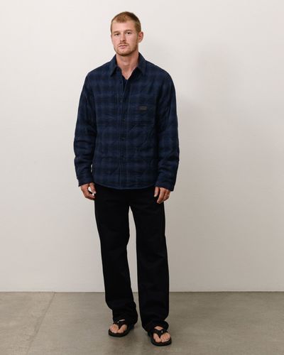 stussy-1110403-quilted-plaid-shirt-jacket-navy.jpg