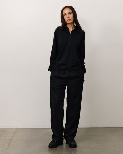 stussy-1140406-hooded-utility-pullover-black.jpg