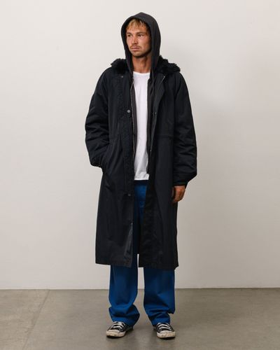 stussy-115956-fur-hood-long-parka-black.jpg