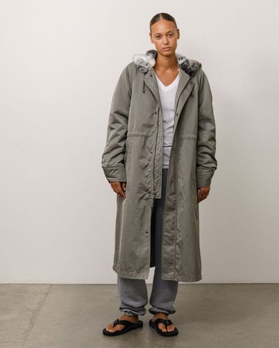 stussy-115956-fur-hood-long-parka-green.jpg