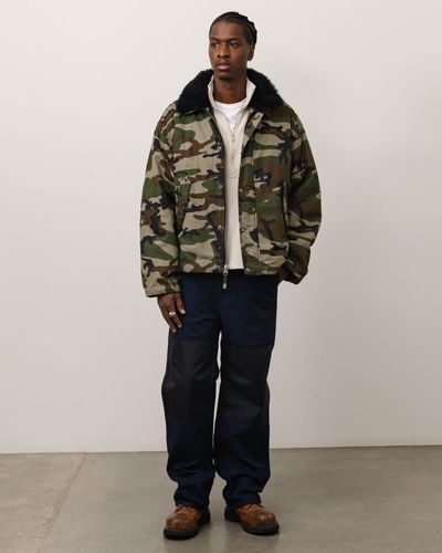 stussy-115963-convertible-deck-jacket-woodland-camo.jpg