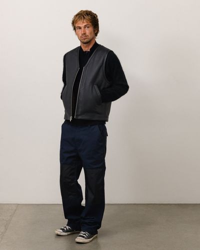 stussy-115965-pile-lined-leather-vest-black.jpg