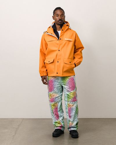 stussy-26olj1582-denim-tears-columbia-jacket-orange.jpg