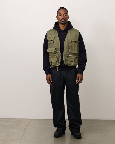 stussy-3904047-denim-tears-fishing-vest-green.jpg